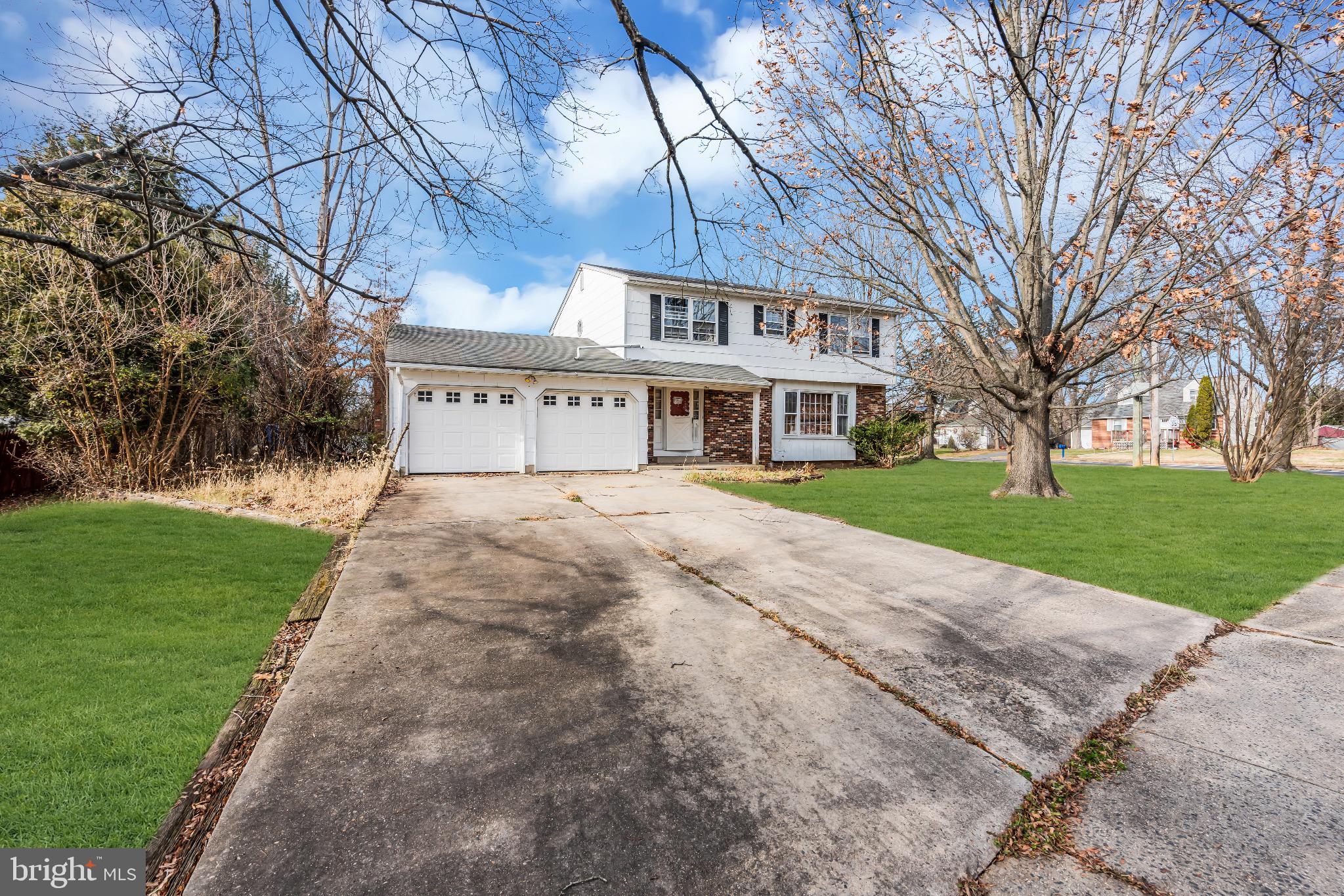 1 Colleen Circle Ewing, NJ 08638 - Photo 5 of 12 a view of house with yard and green space
