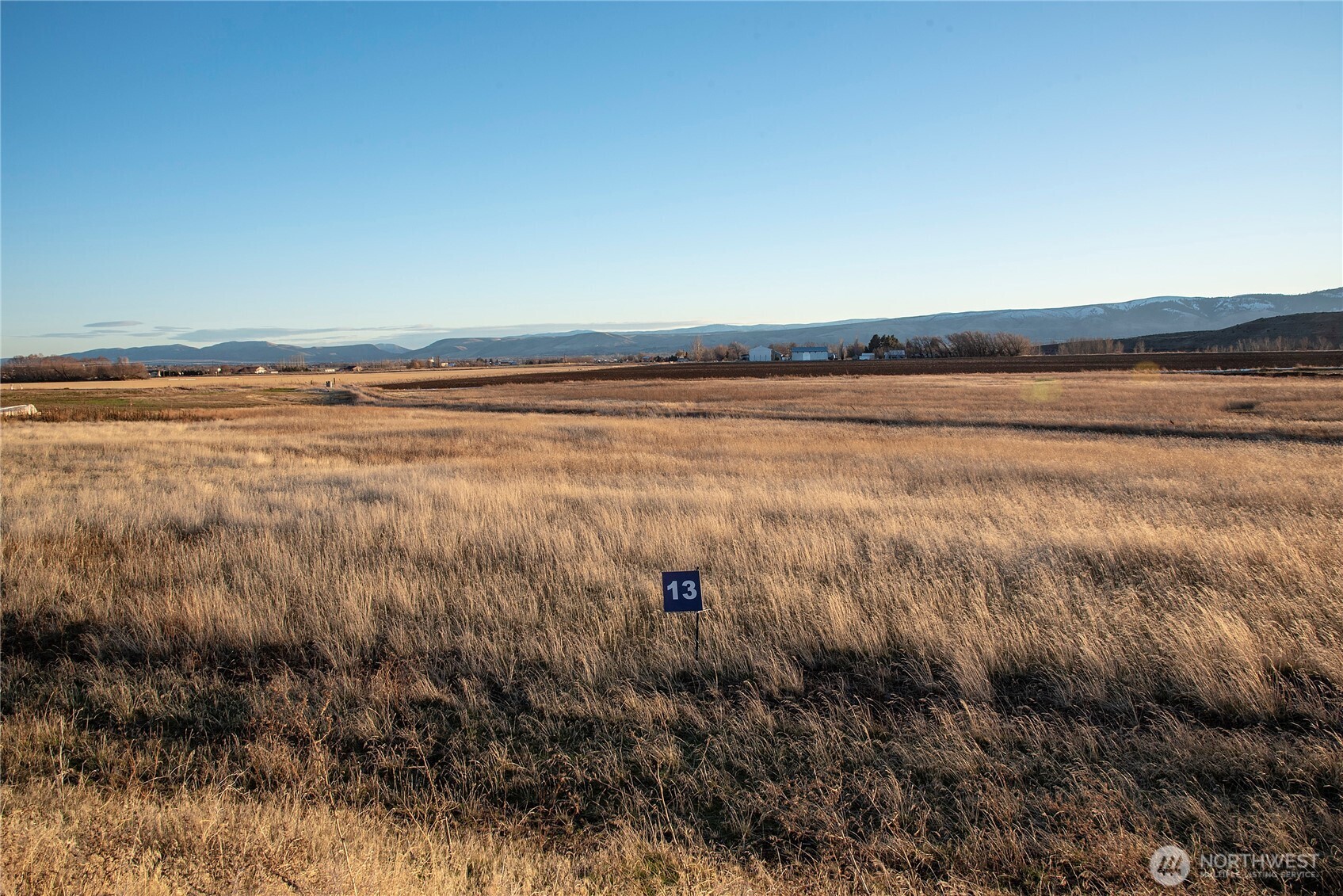 a view of an ocean and mountain