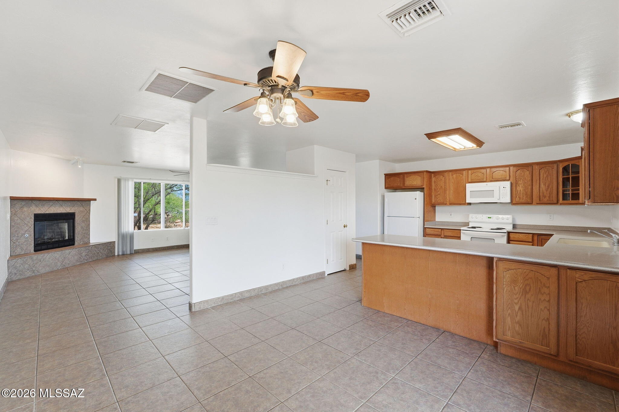 1462 Circulo Sombrero Rio Rico, AZ 85648 - Photo 17 of 50 Tiled floor for a clean look and easy to keep your home looking fresh and clean.