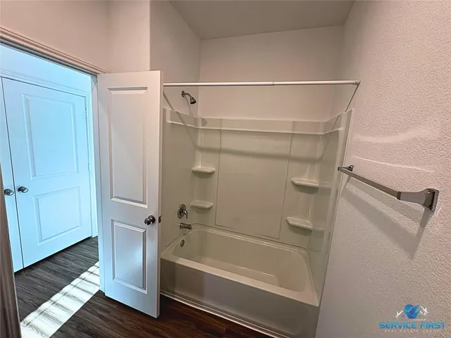 a bathroom with a bathtub
