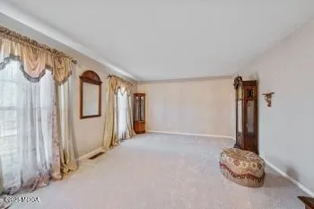 a view of entryway with livingroom