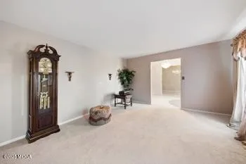 a view of a livingroom with a staircase