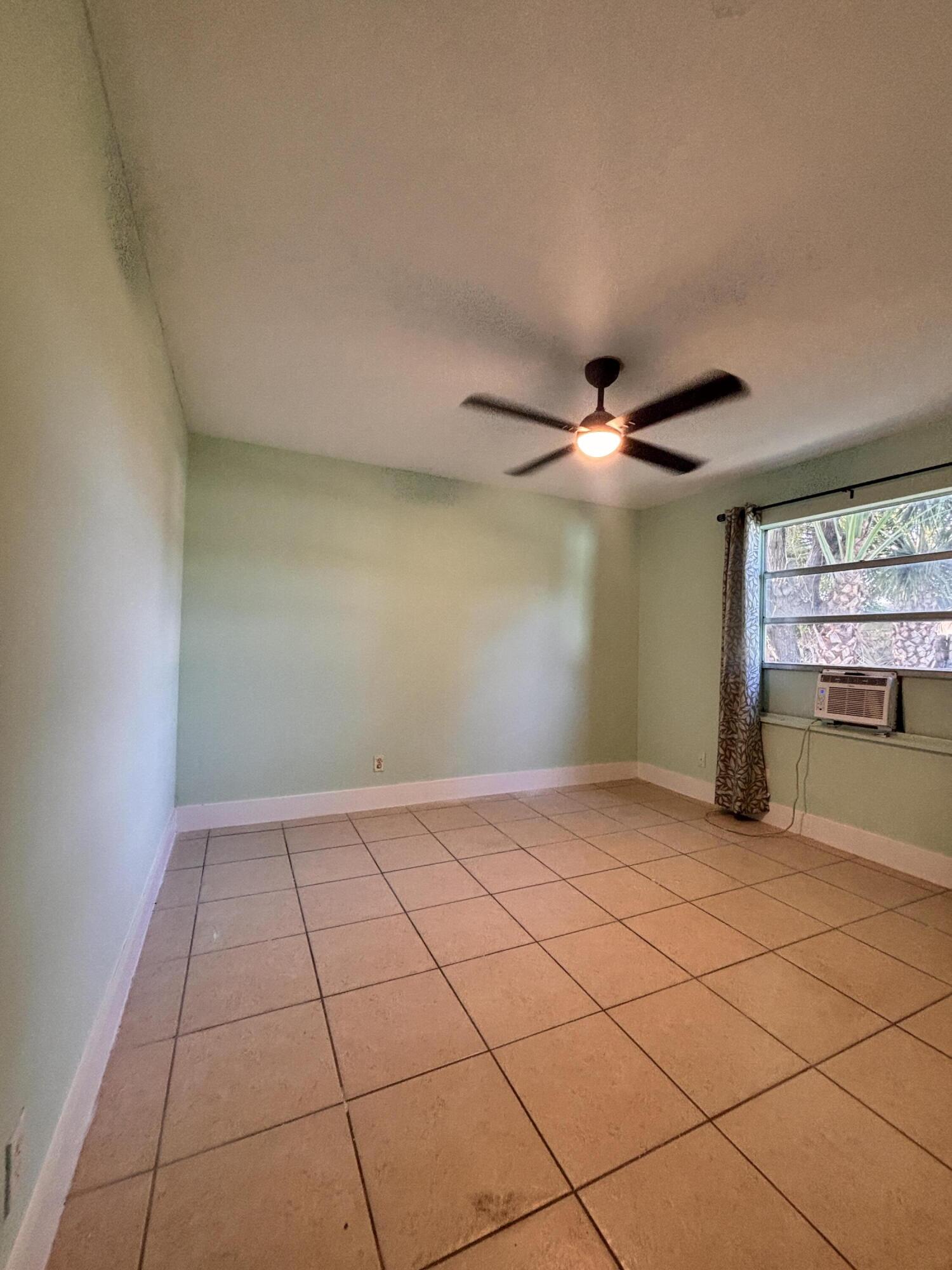 1328 West 6th Street Riviera Beach, FL 33404 - Photo 7 of 11 a view of an empty room