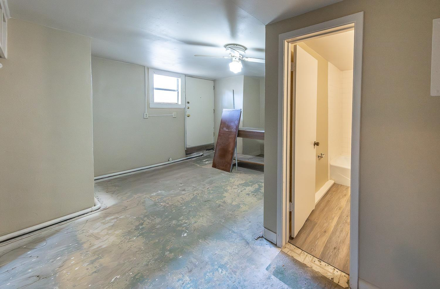 2104 14th Street Lubbock, TX 79401 - Photo 14 of 17 a view of a room that has a bench in it