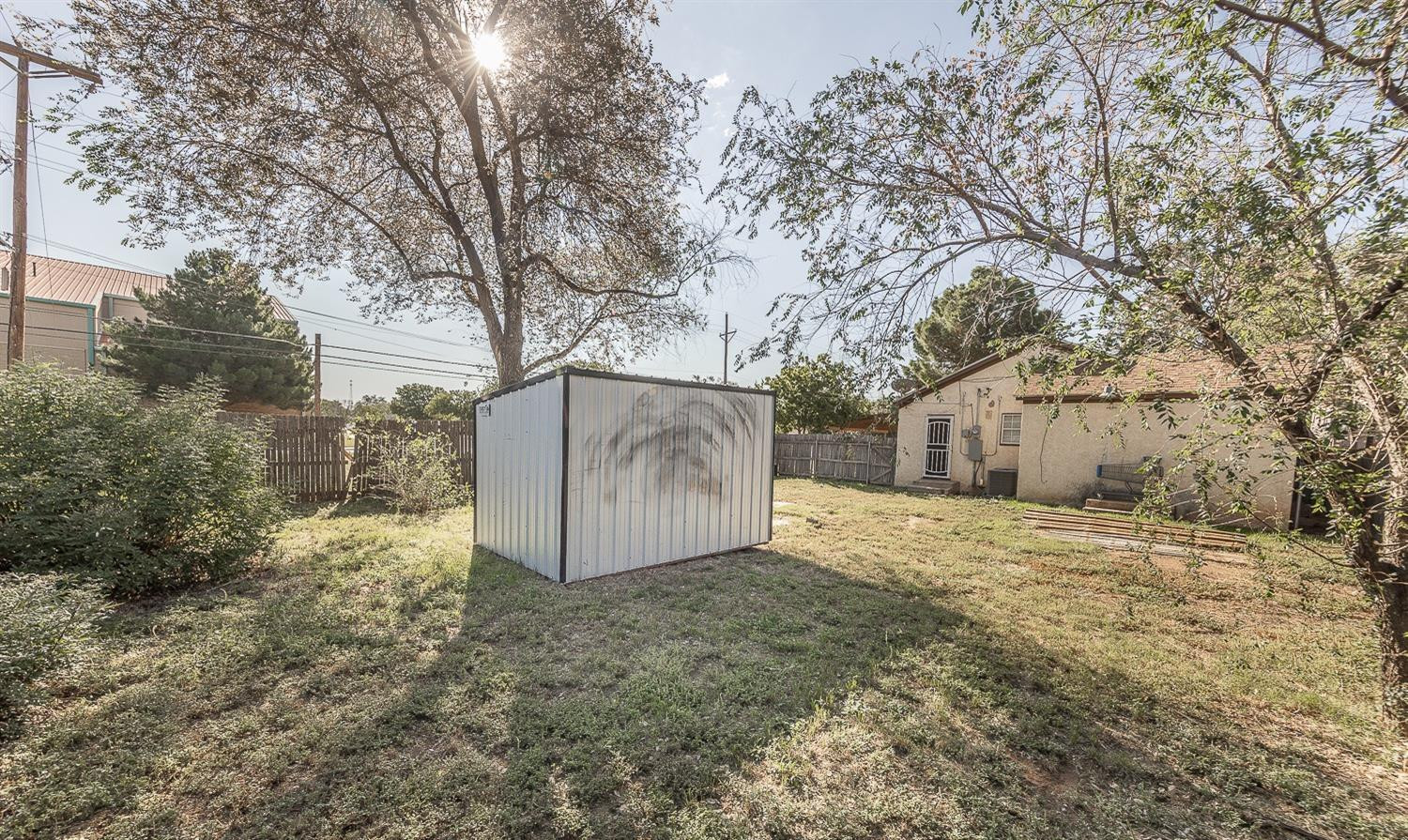 2104 14th Street Lubbock, TX 79401 - Photo 17 of 17 a view of back yard of the house