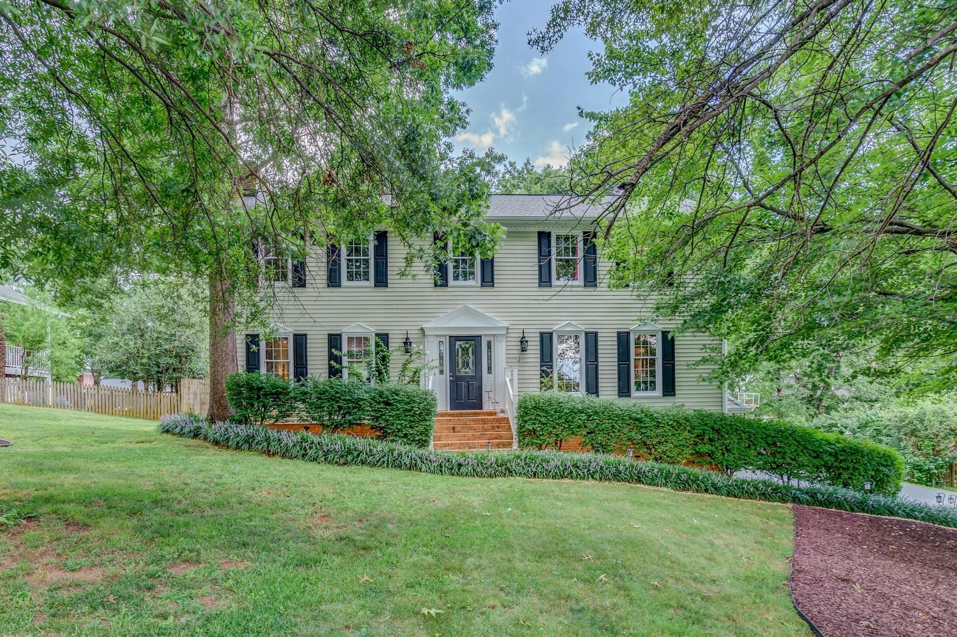 366 Stonehaven Lane Blue Ridge, VA 24064 - Photo 1 of 37 a front view of a house with a garden