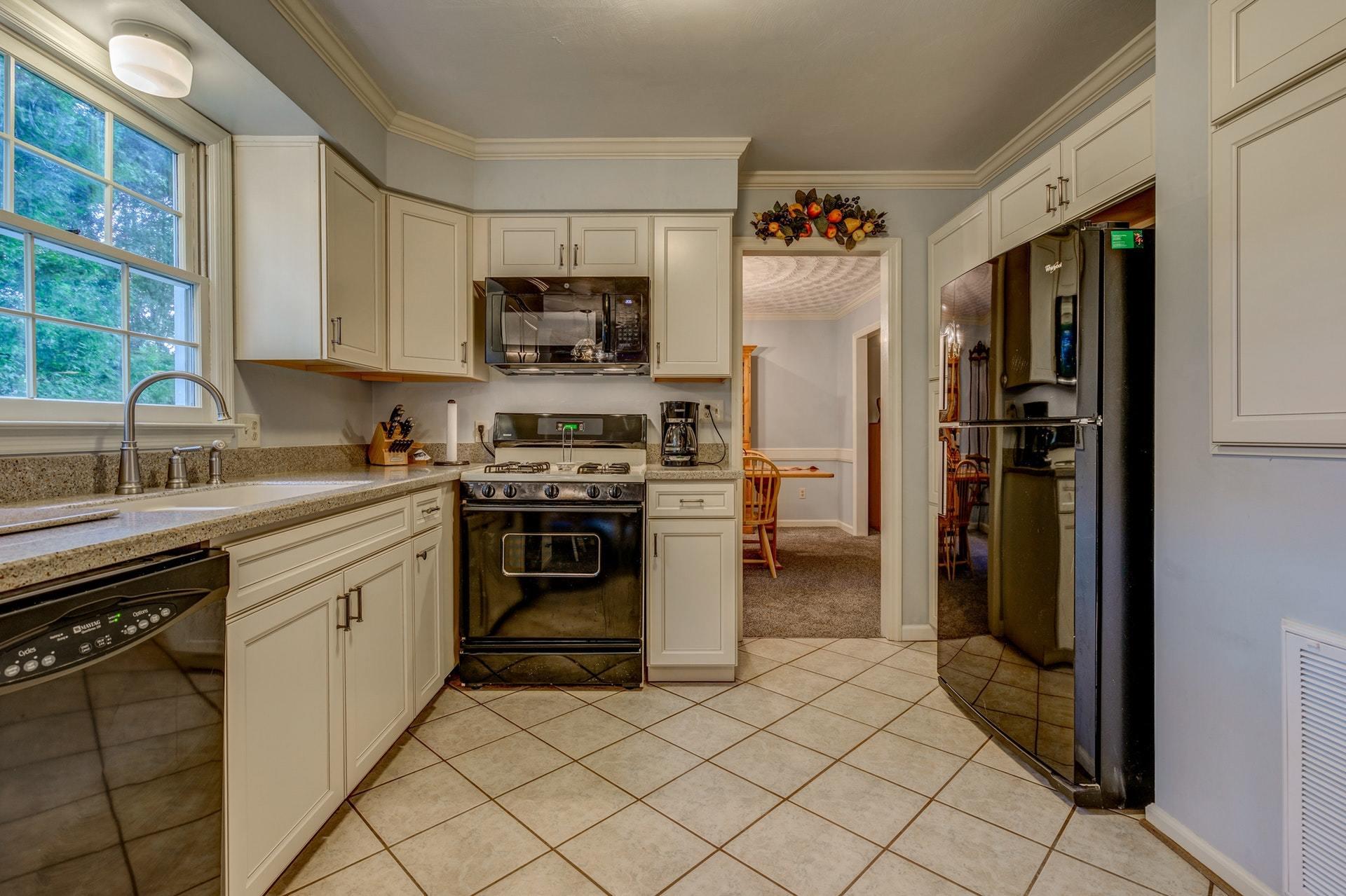 366 Stonehaven Lane Blue Ridge, VA 24064 - Photo 11 of 37 a kitchen with stainless steel appliances granite countertop a refrigerator sink and stove