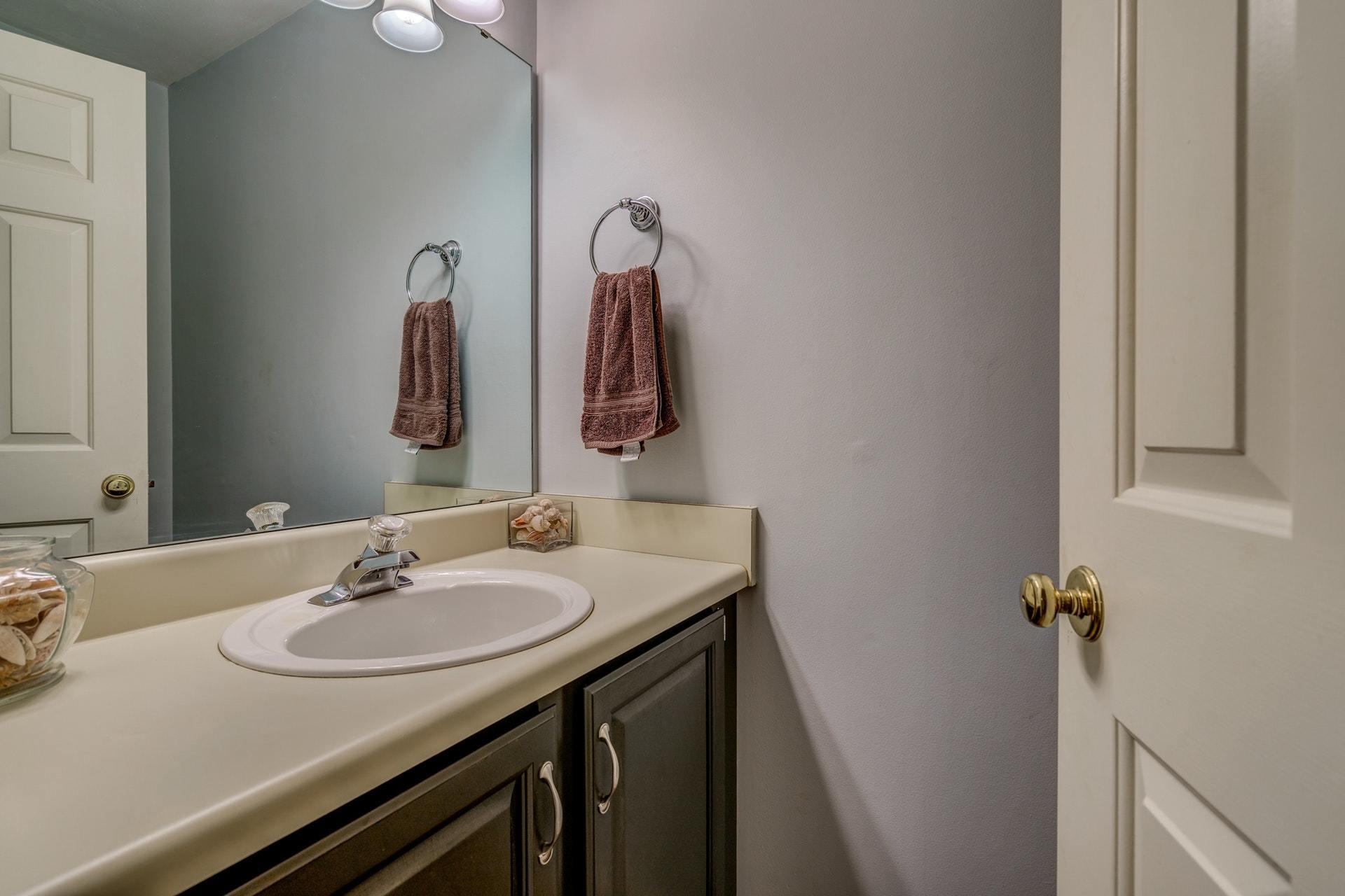 366 Stonehaven Lane Blue Ridge, VA 24064 - Photo 17 of 37 a bathroom with a sink and a mirror