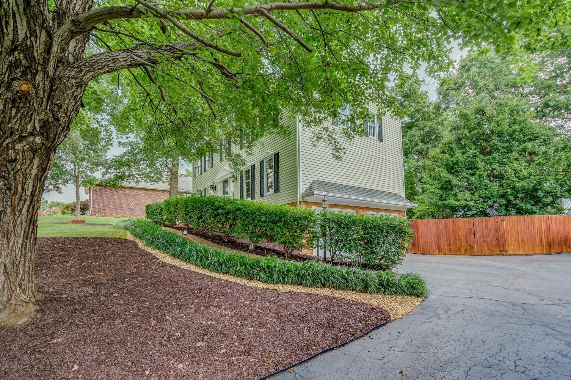 366 Stonehaven Lane Blue Ridge, VA 24064 - Photo 5 of 37 a front view of a house with garden