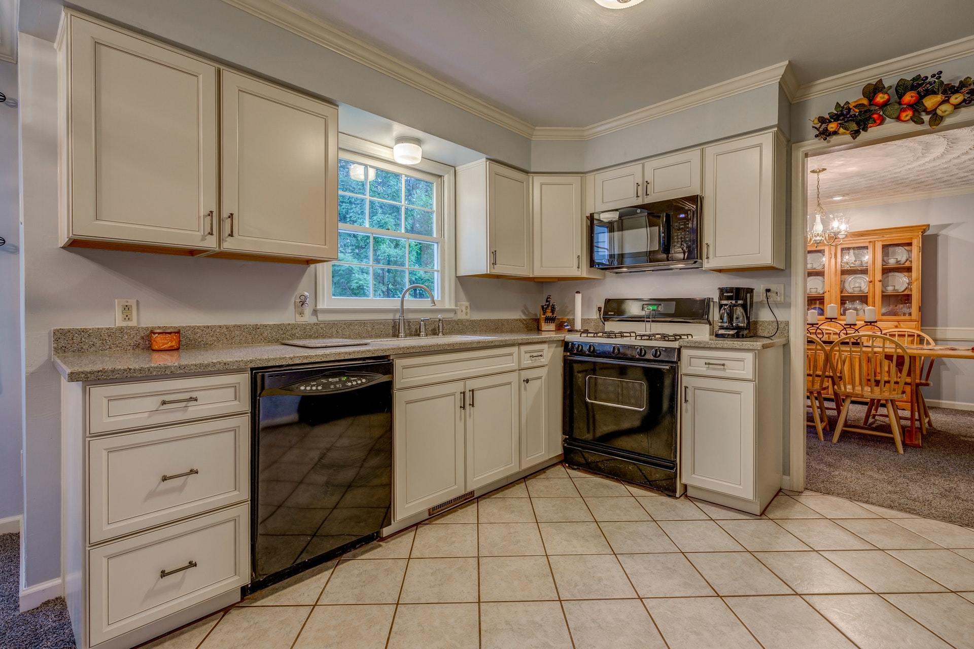 366 Stonehaven Lane Blue Ridge, VA 24064 - Photo 10 of 37 a kitchen with cabinets appliances and a window
