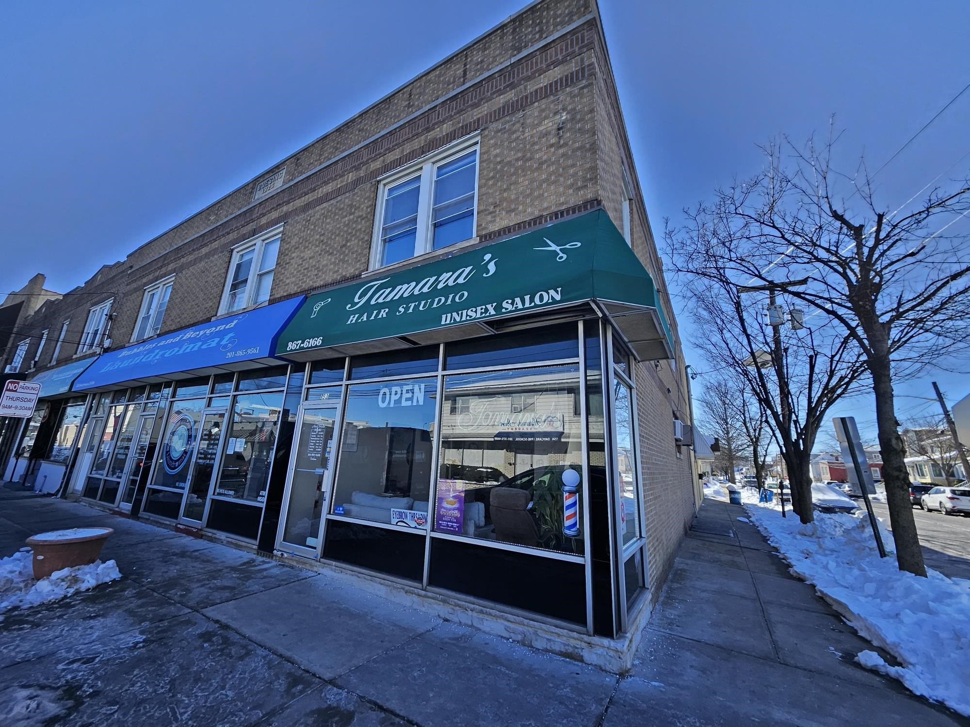 155 Front Street, Unit 2 Secaucus, NJ 07094 - Photo 12 of 19 a view of wooden house with a large window