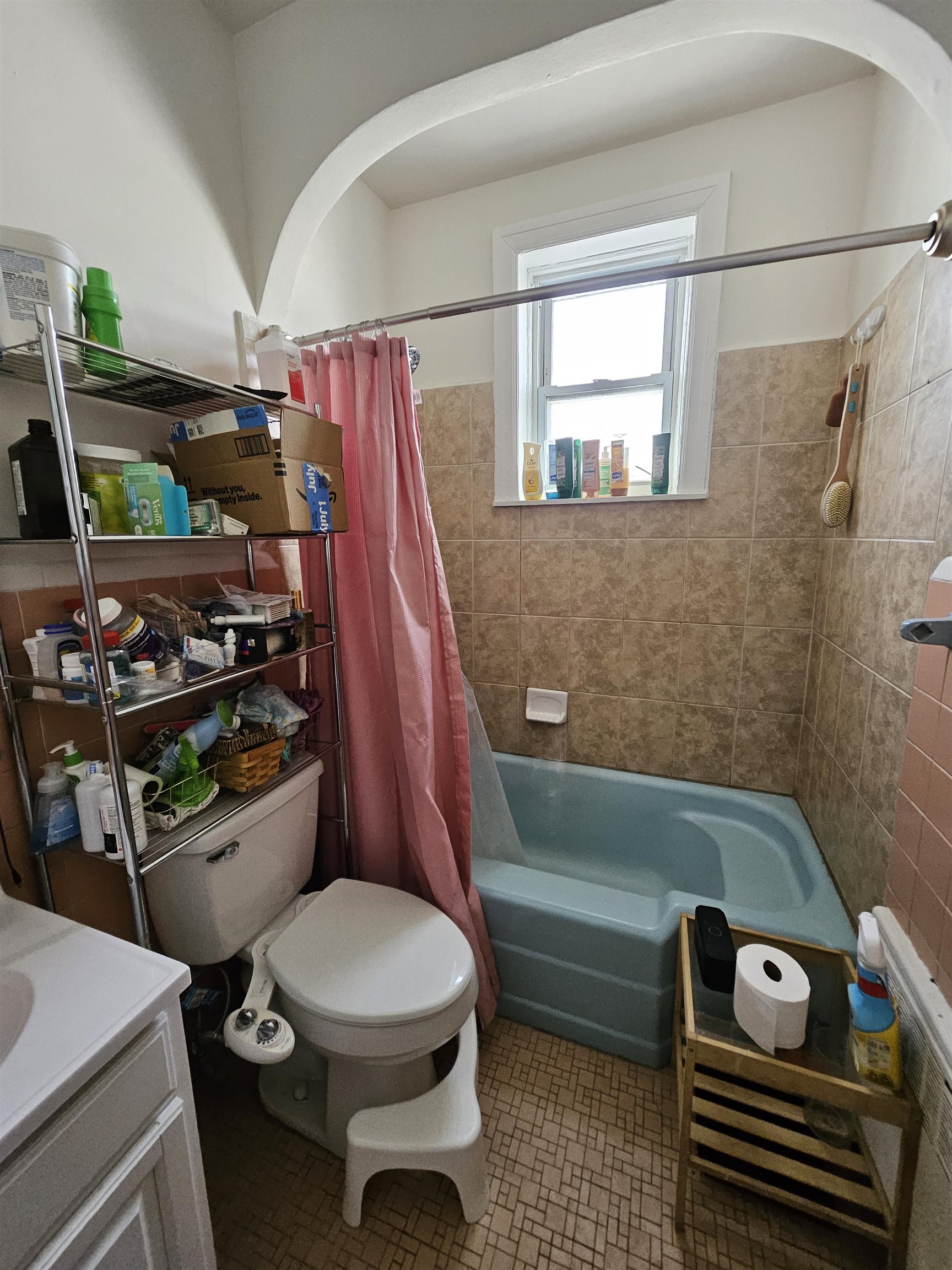 155 Front Street, Unit 3 Secaucus, NJ 07094 - Photo 12 of 27 a bathroom with a toilet a sink and bathtub