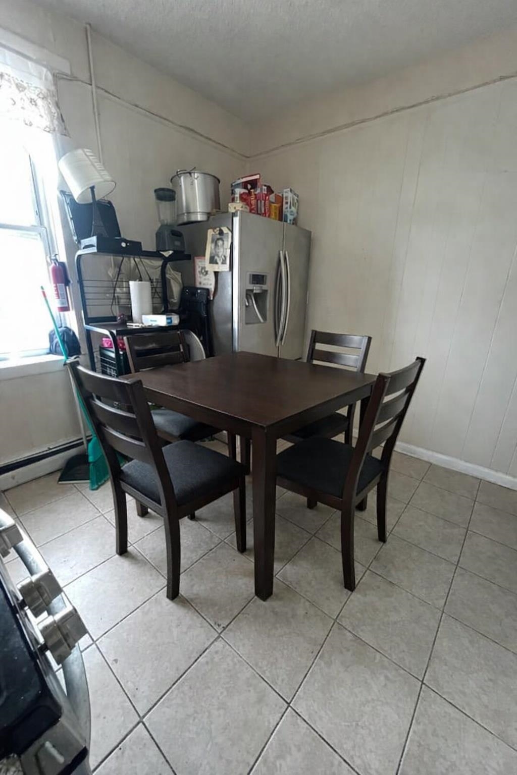 155 Front Street, Unit 2 Secaucus, NJ 07094 - Photo 2 of 19 a view of a dining room with furniture and a chandelier