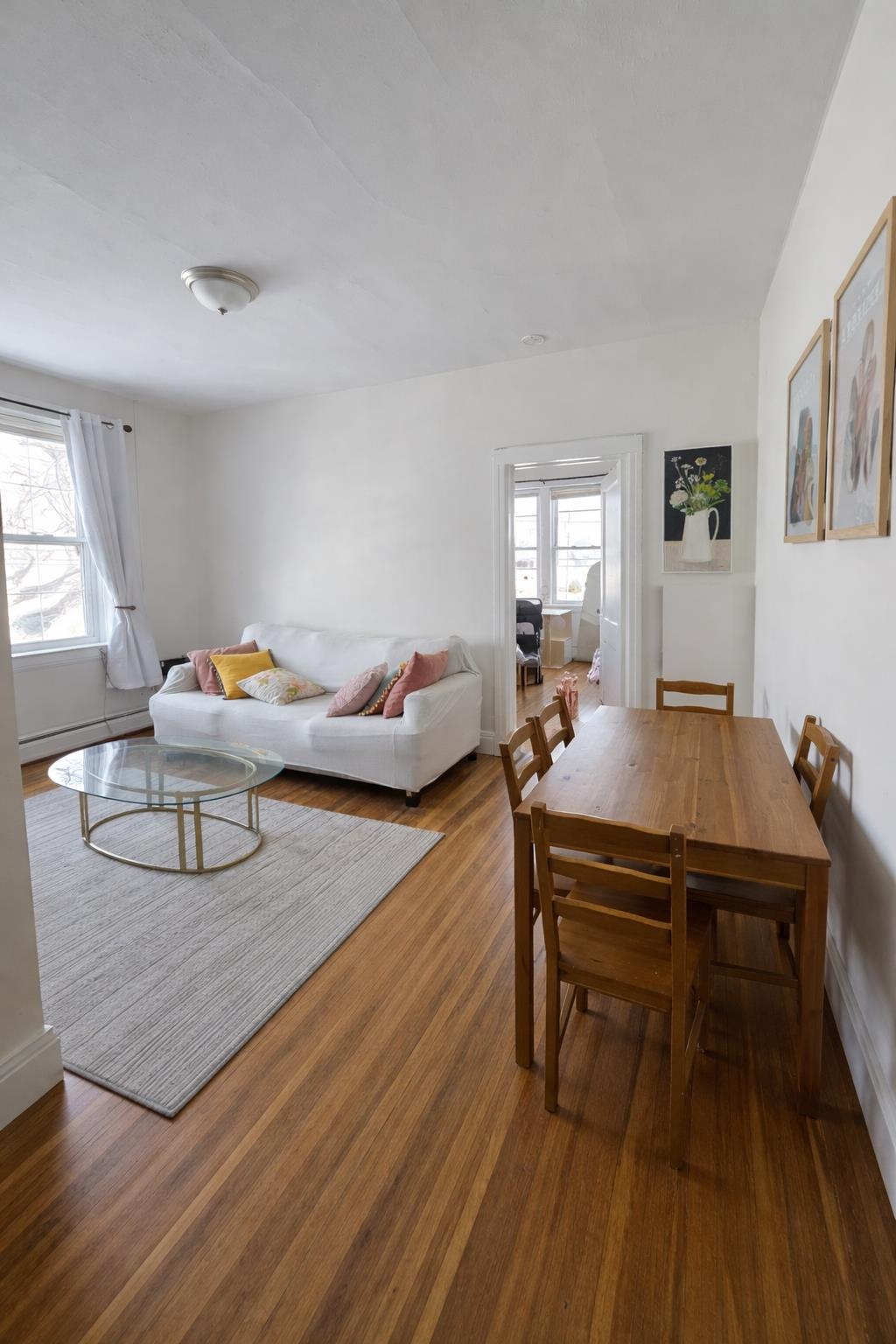 155 Front Street, Unit 3 Secaucus, NJ 07094 - Photo 4 of 27 a living room with furniture and wooden floor