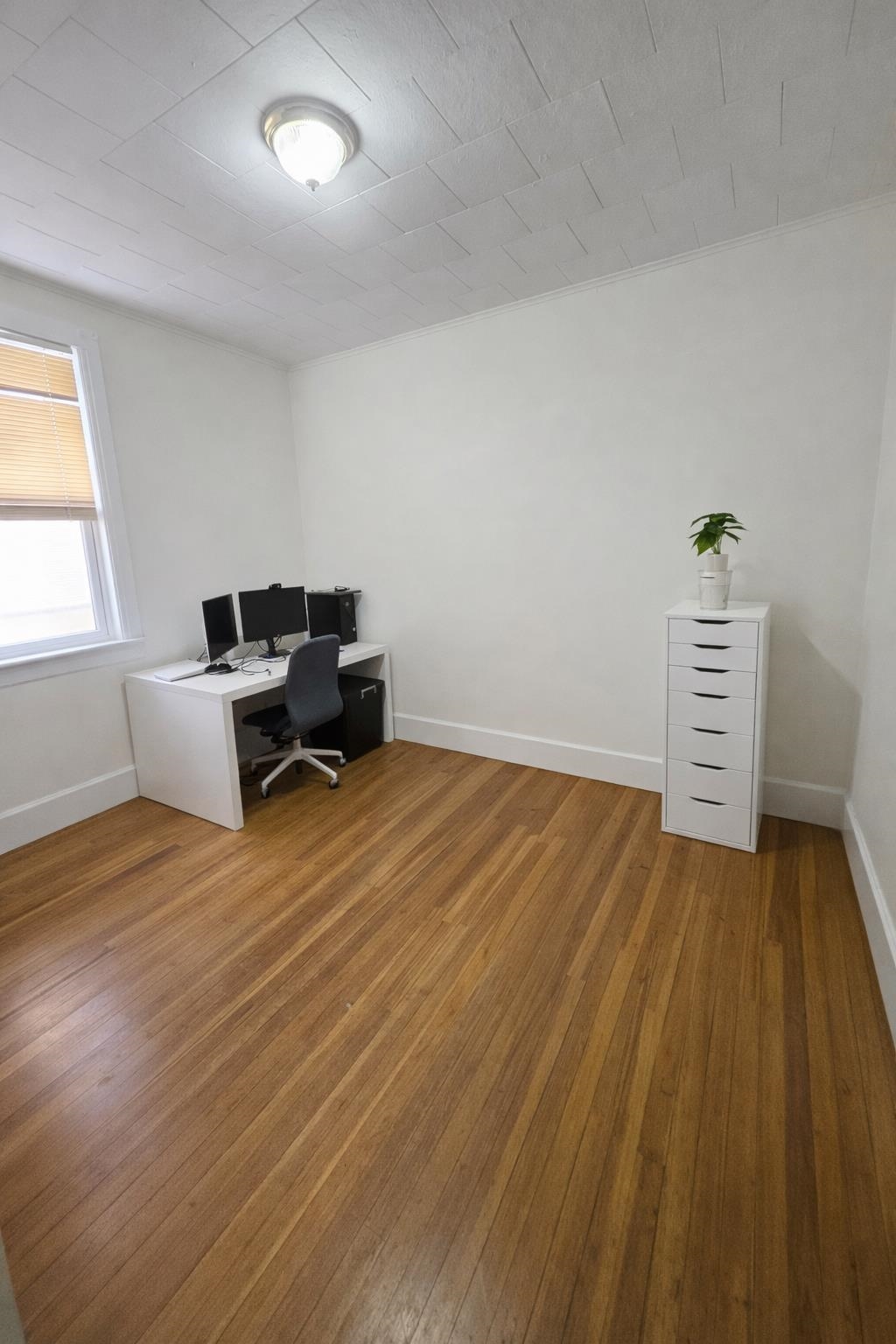 155 Front Street, Unit 3 Secaucus, NJ 07094 - Photo 9 of 27 a room with furniture and wooden floor
