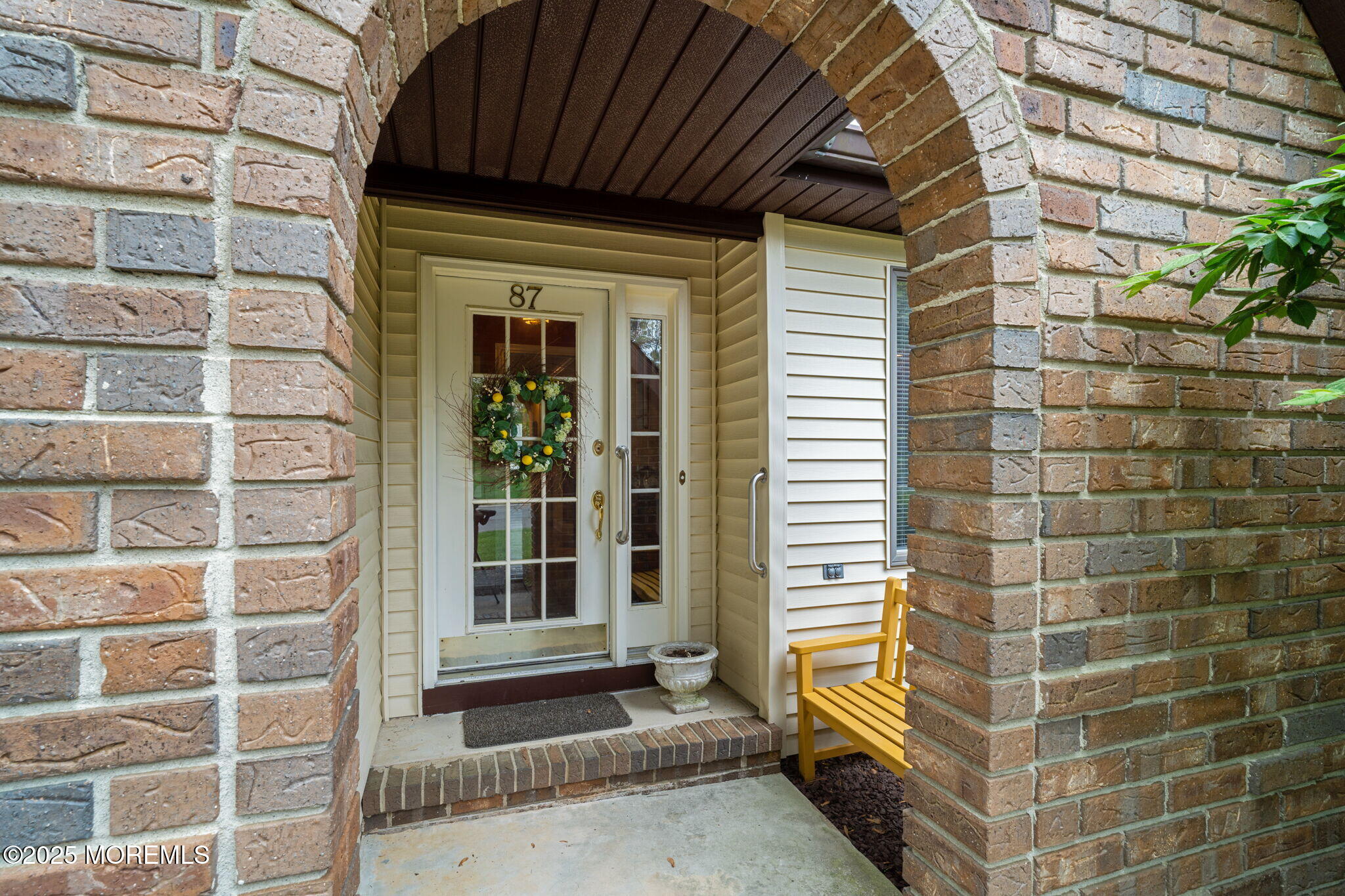 87 Ash Road, Unit 2 Manahawkin, NJ 08050 - Photo 6 of 27 a front view of a house with a window