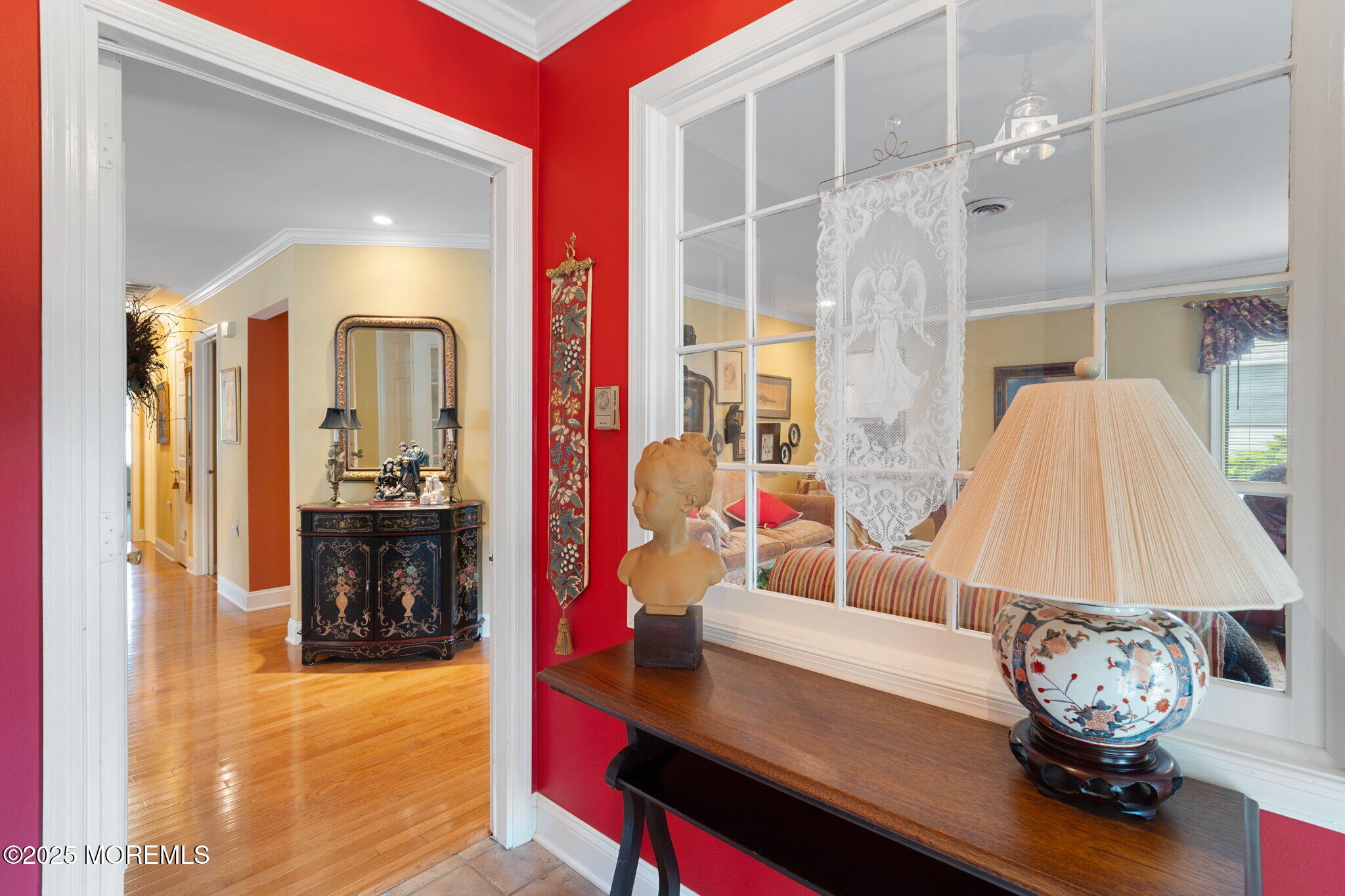 87 Ash Road, Unit 2 Manahawkin, NJ 08050 - Photo 7 of 27 a living room with furniture and a table
