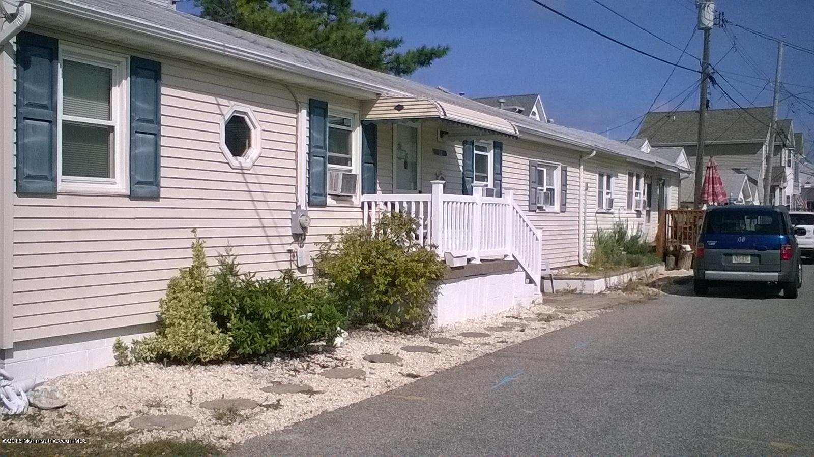 13 West Rutherford Lane Lavallette, NJ 08735 - Photo 15 of 33 Front