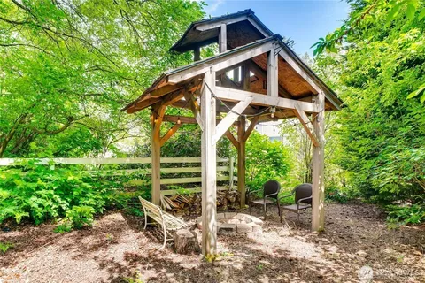 a house with trees in the background