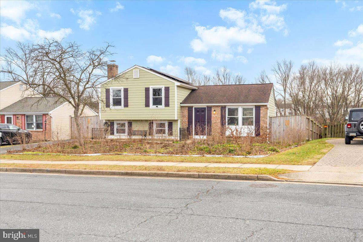 1489 Eden Drive Frederick, MD 21701 - Photo 2 of 43 a view of a house with a yard and a large tree