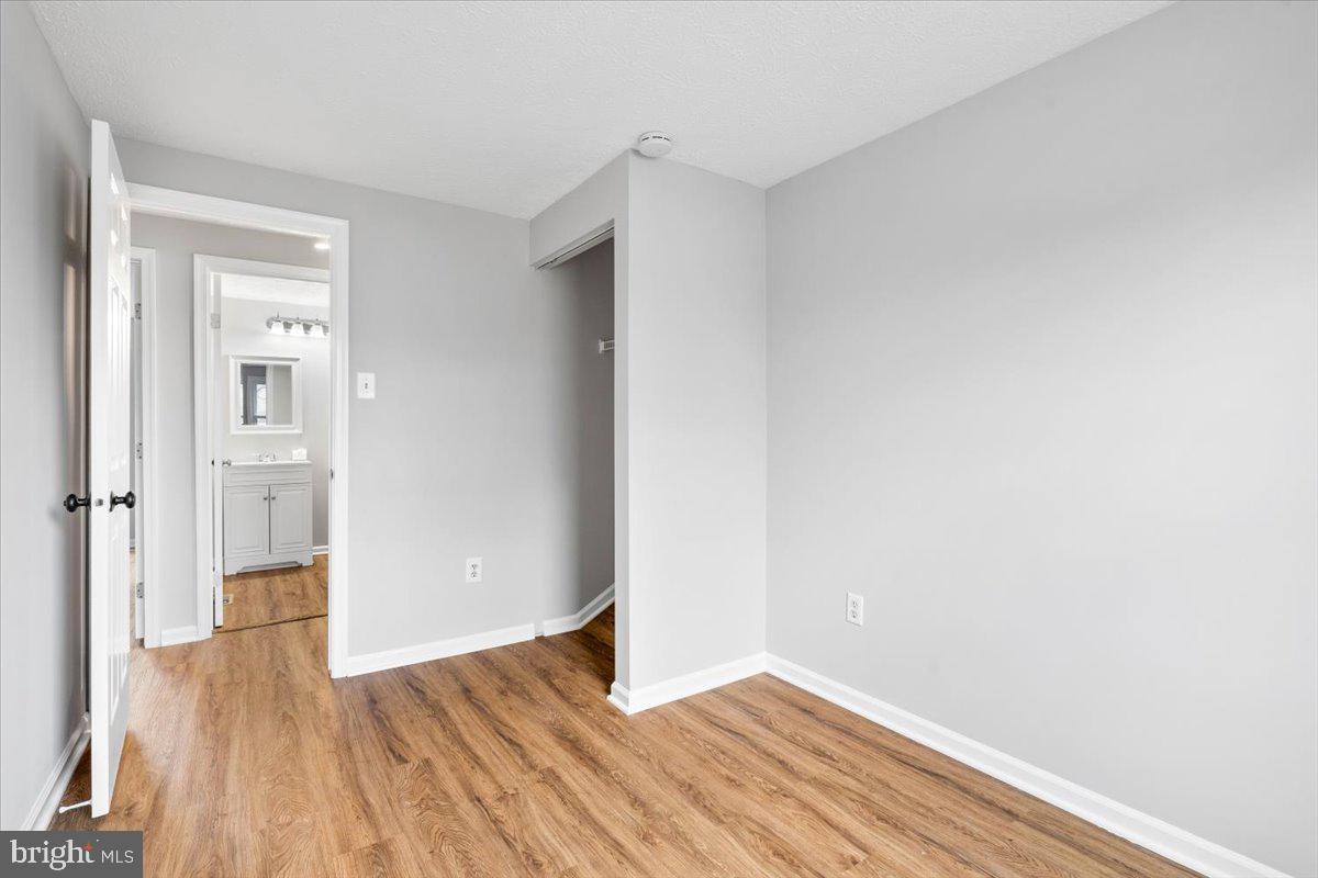1489 Eden Drive Frederick, MD 21701 - Photo 25 of 43 a view of an empty room and wooden floor