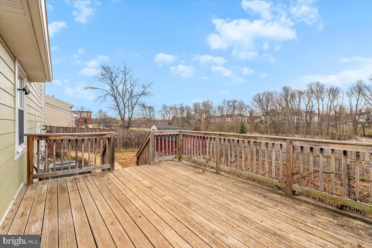 1489 Eden Drive Frederick, MD 21701 - Photo 33 of 43 a view of balcony with wooden floor and fence