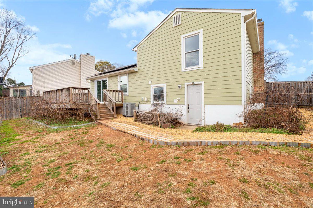 1489 Eden Drive Frederick, MD 21701 - Photo 35 of 43 a view of a house with a yard and garage