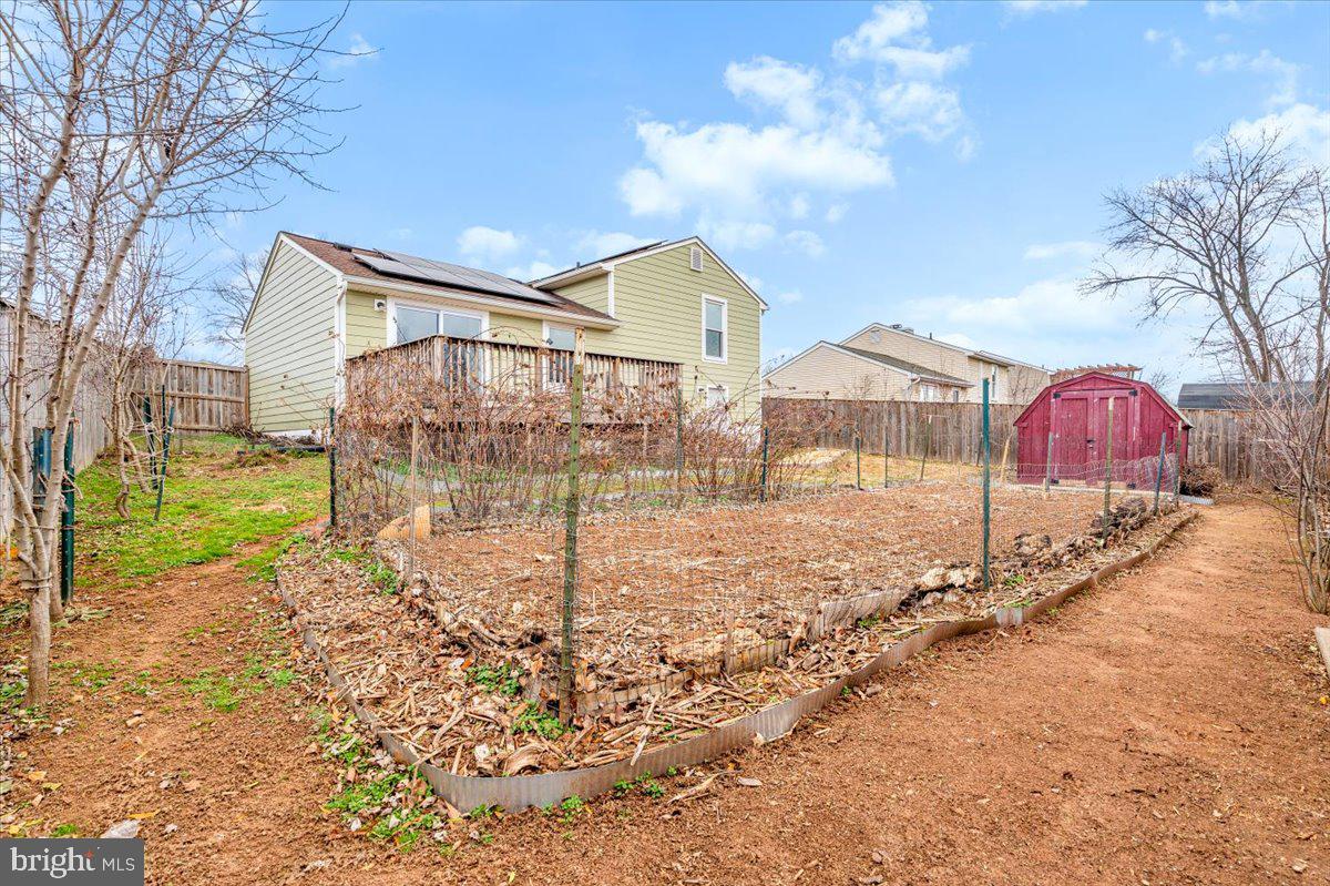 1489 Eden Drive Frederick, MD 21701 - Photo 38 of 43 a view of a house with backyard and a snow