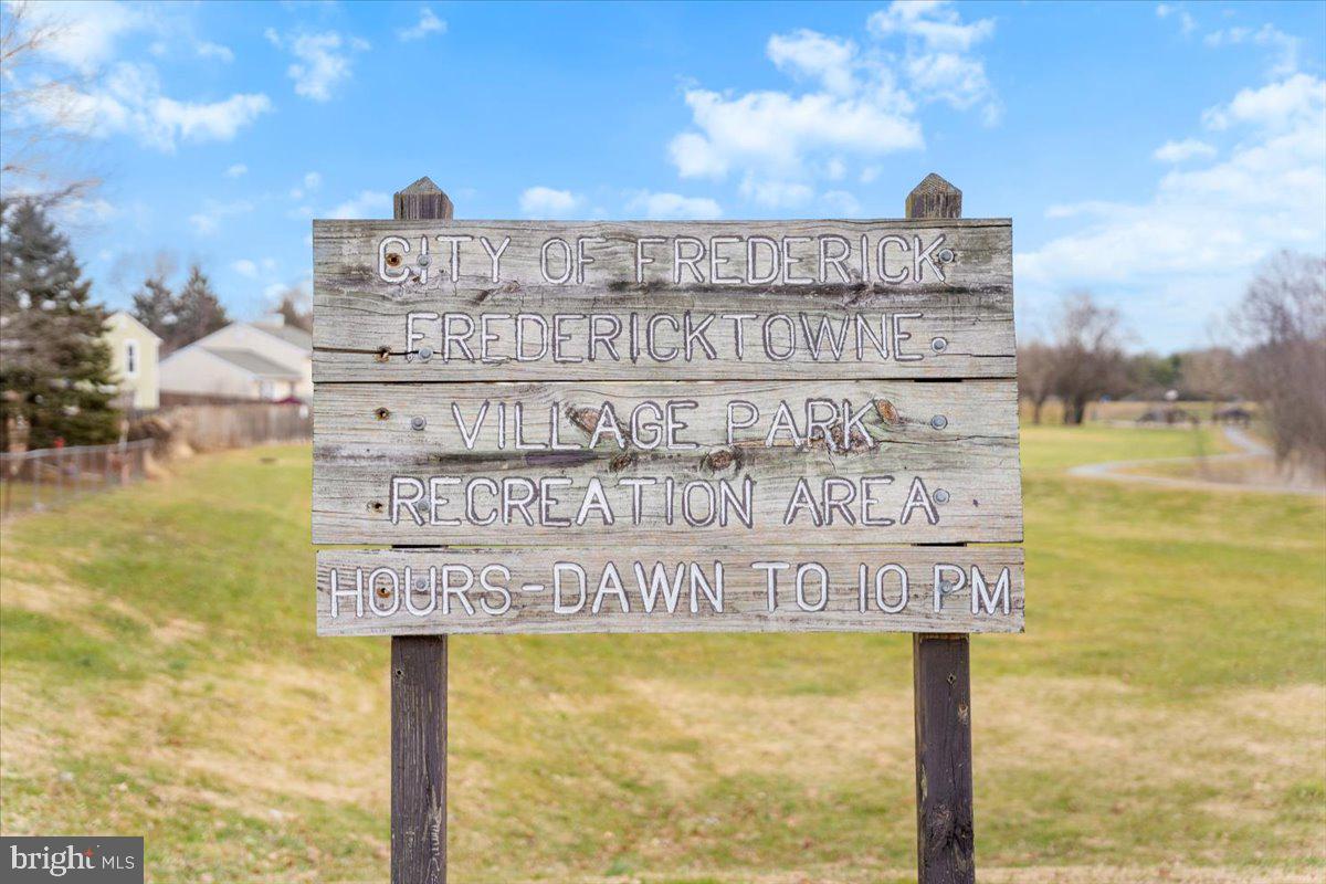 1489 Eden Drive Frederick, MD 21701 - Photo 42 of 43 a sign board with building in the background