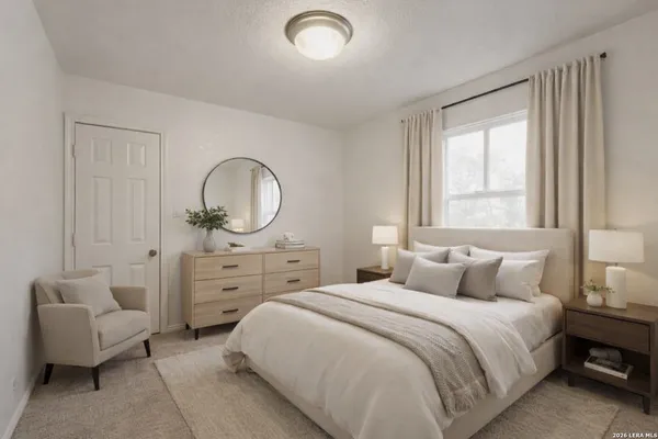 an empty room with windows and closet