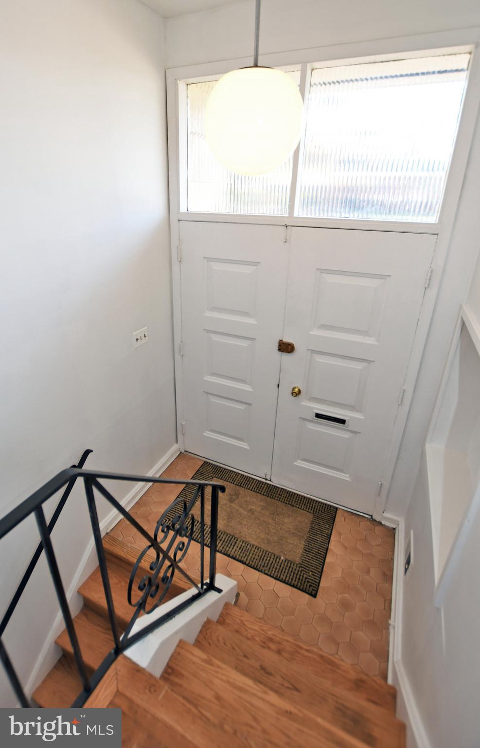 811 Whittington Terrace Silver Spring, MD 20901 - Photo 5 of 31 Sunny foyer entry.