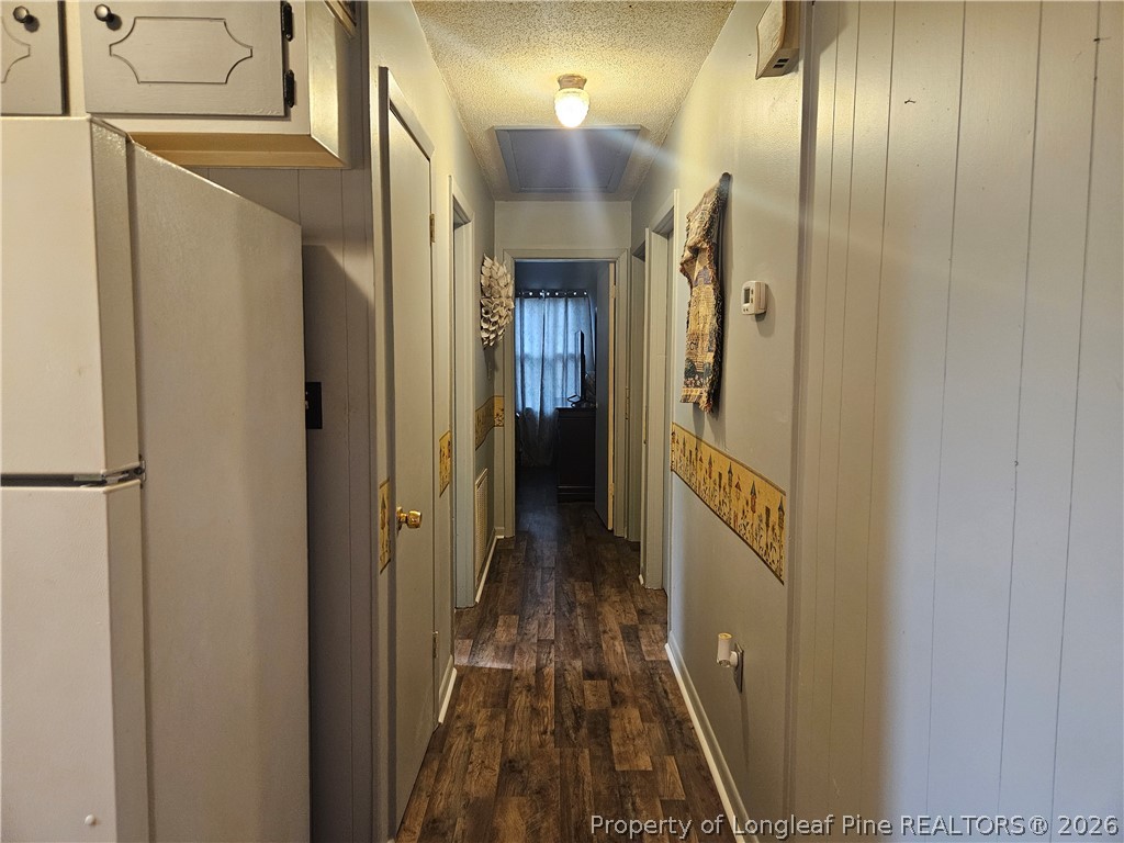 4547 Legion Road Hope Mills, NC 28348 - Photo 14 of 28 a view of hallway with wooden floor