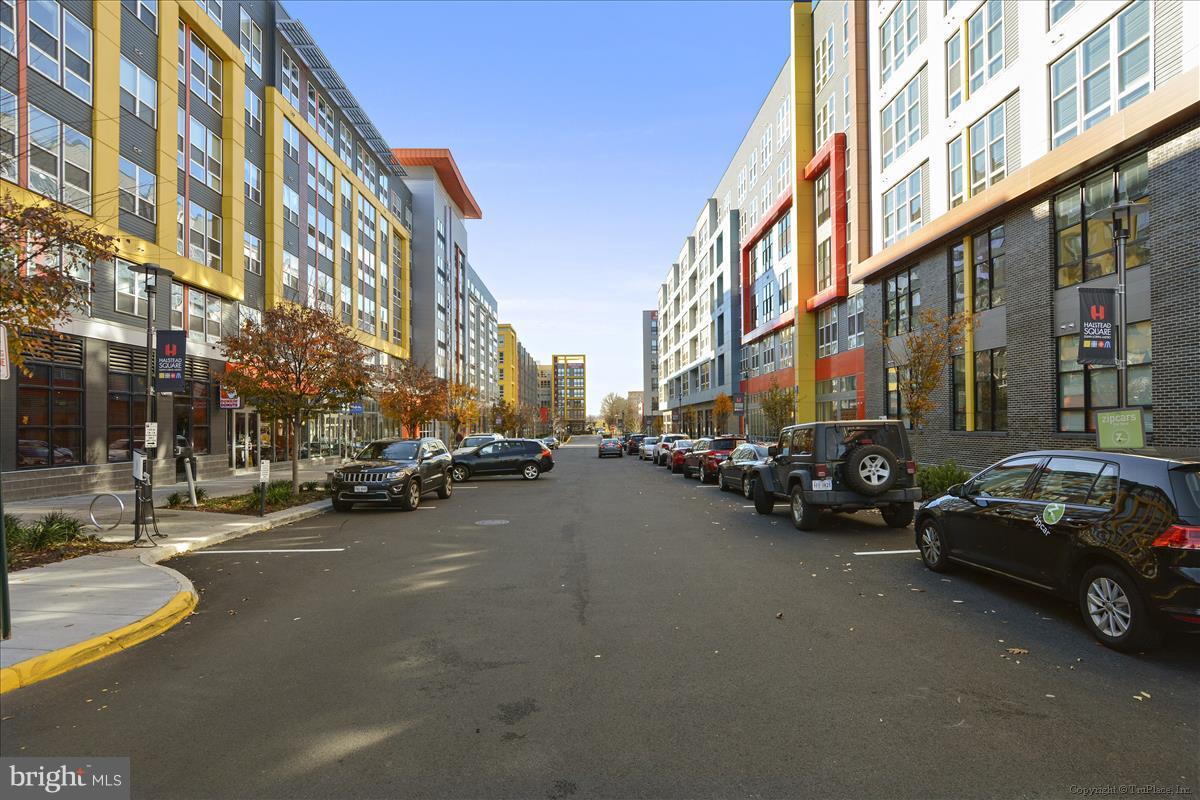 2726 Gallows Road, Unit 612 Vienna, VA 22180 - Photo 19 of 30 a view of a street in cars park both side of building