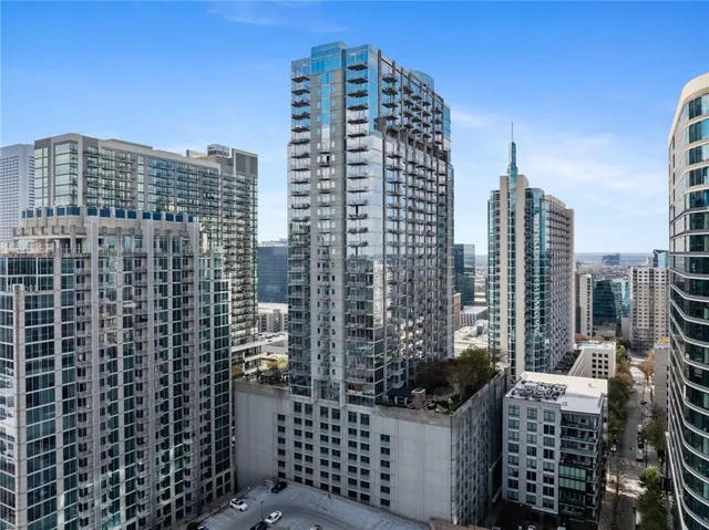 a view of a city with tall buildings