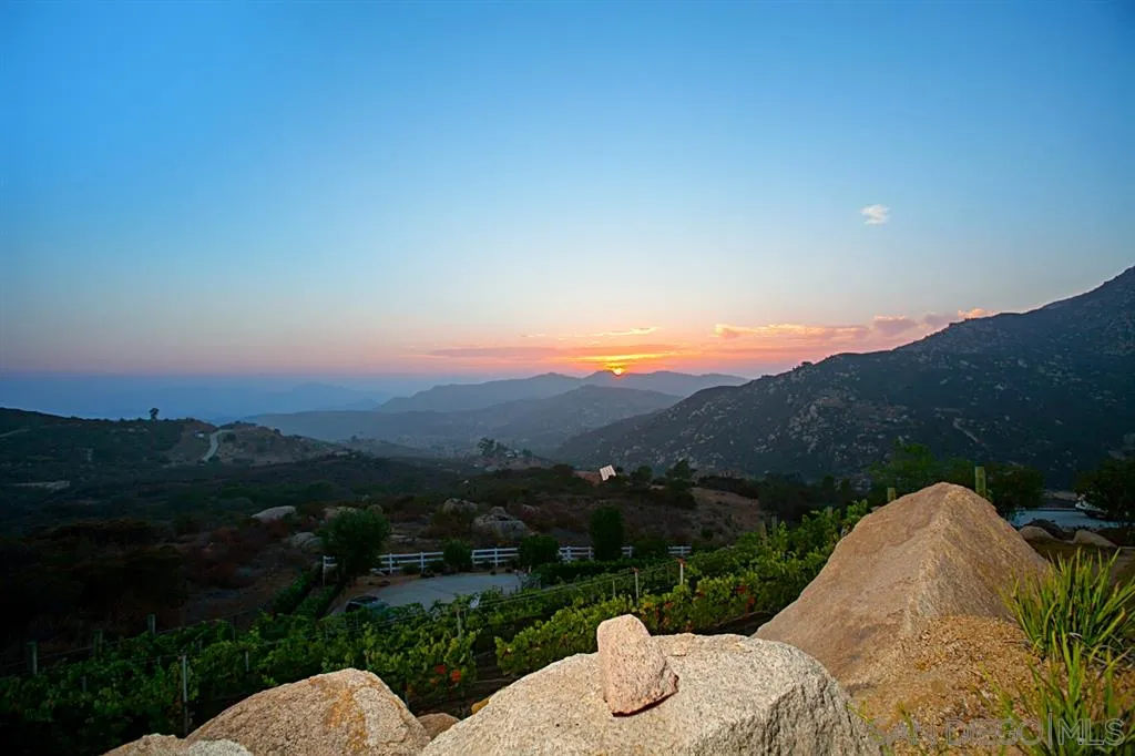 16987 Lyons Valley Road Jamul, CA 91935 - Photo 1 of 25 a view of a table and chairs in backyard