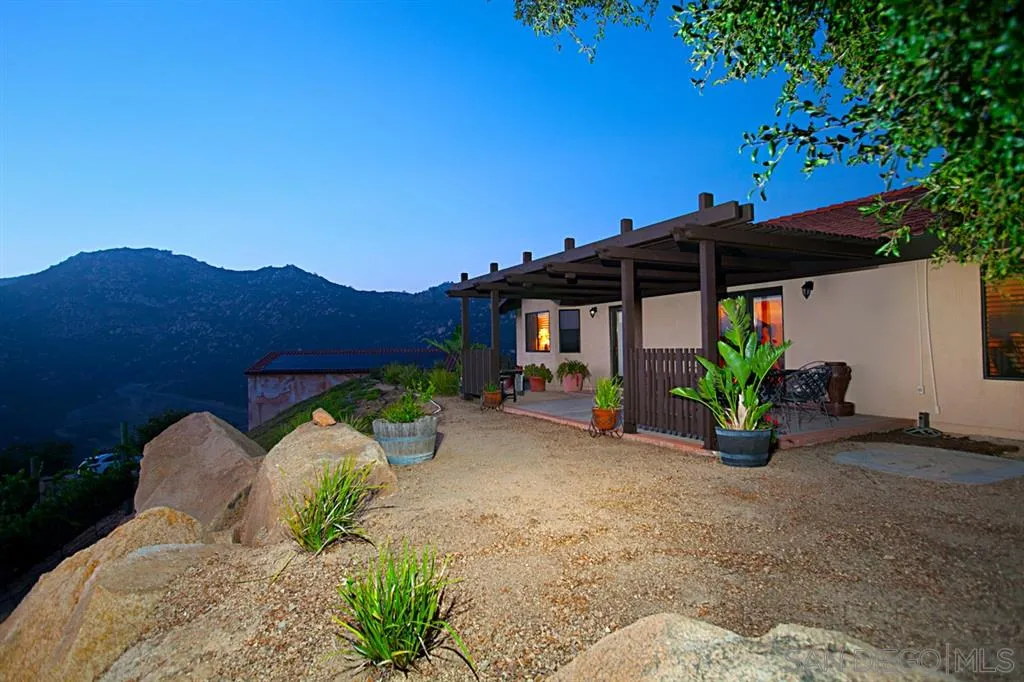 16987 Lyons Valley Road Jamul, CA 91935 - Photo 4 of 25 a front view of a house with garden