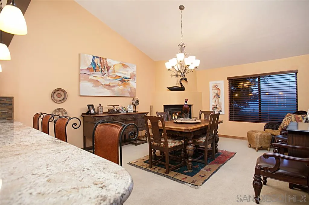 16987 Lyons Valley Road Jamul, CA 91935 - Photo 9 of 25 a view of a workspace with furniture and a chandelier