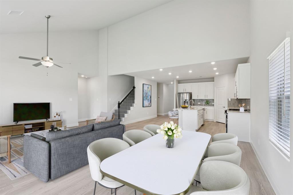 2206 Windy Trail Princeton, TX 75407 - Photo 13 of 34 a living room with furniture and a flat screen tv