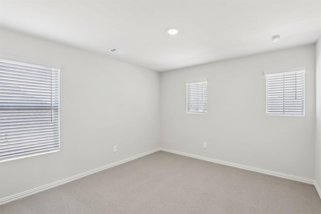 2206 Windy Trail Princeton, TX 75407 - Photo 21 of 34 an empty room with a window
