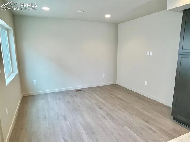 a bathroom with a shower and toilet