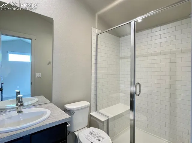 a view of a room with a wooden roof and curtain