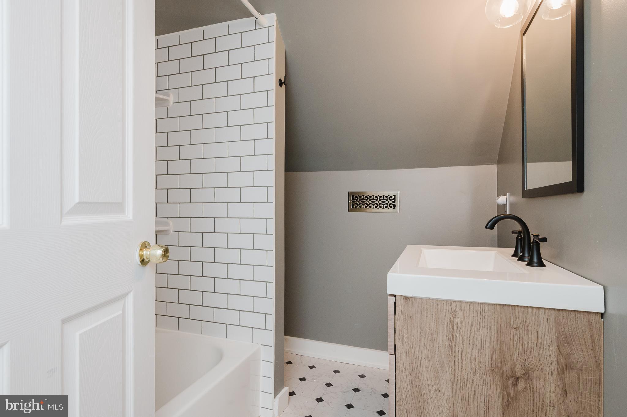416 Enfield Road Joppa, MD 21085 - Photo 32 of 43 Renovated Bathroom upstairs