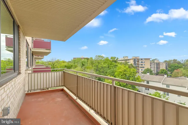 a view of a balcony with city view