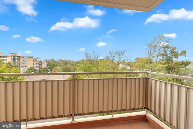 a view of a balcony with an outdoor space