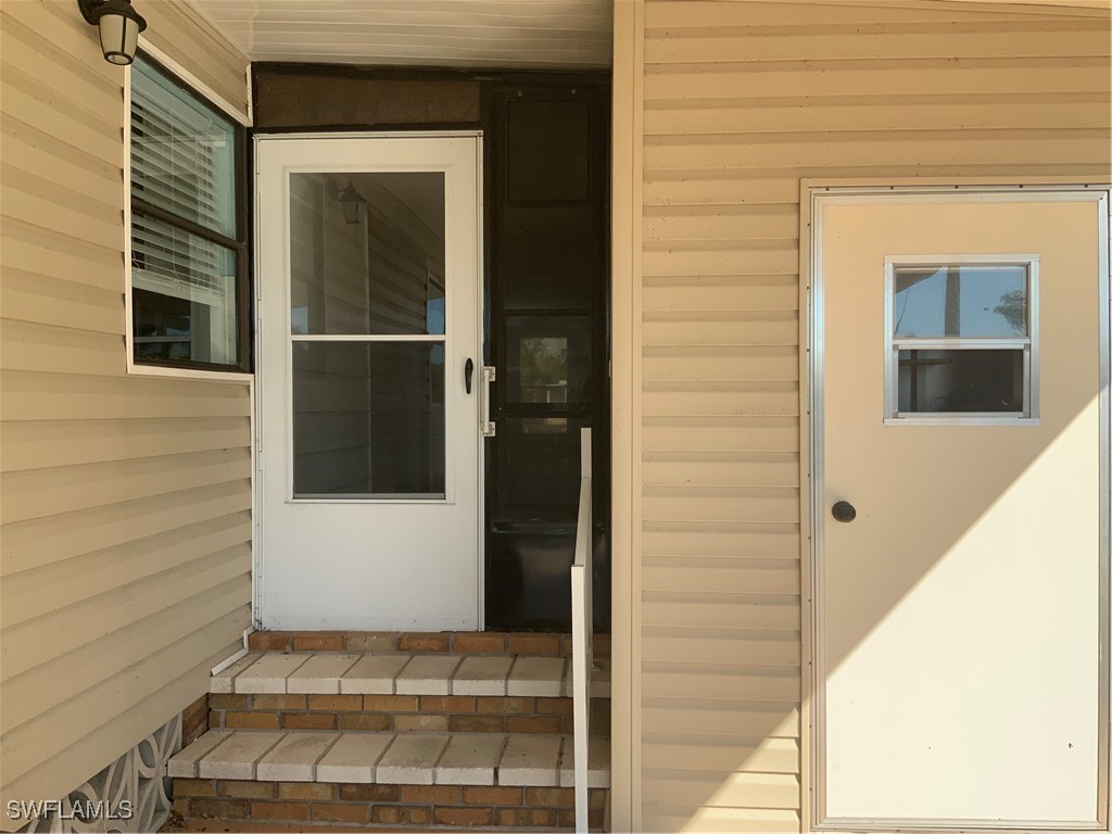 15550 Burnt Store Road, Unit 101 Punta Gorda, FL 33955 - Photo 24 of 28 a view of front door