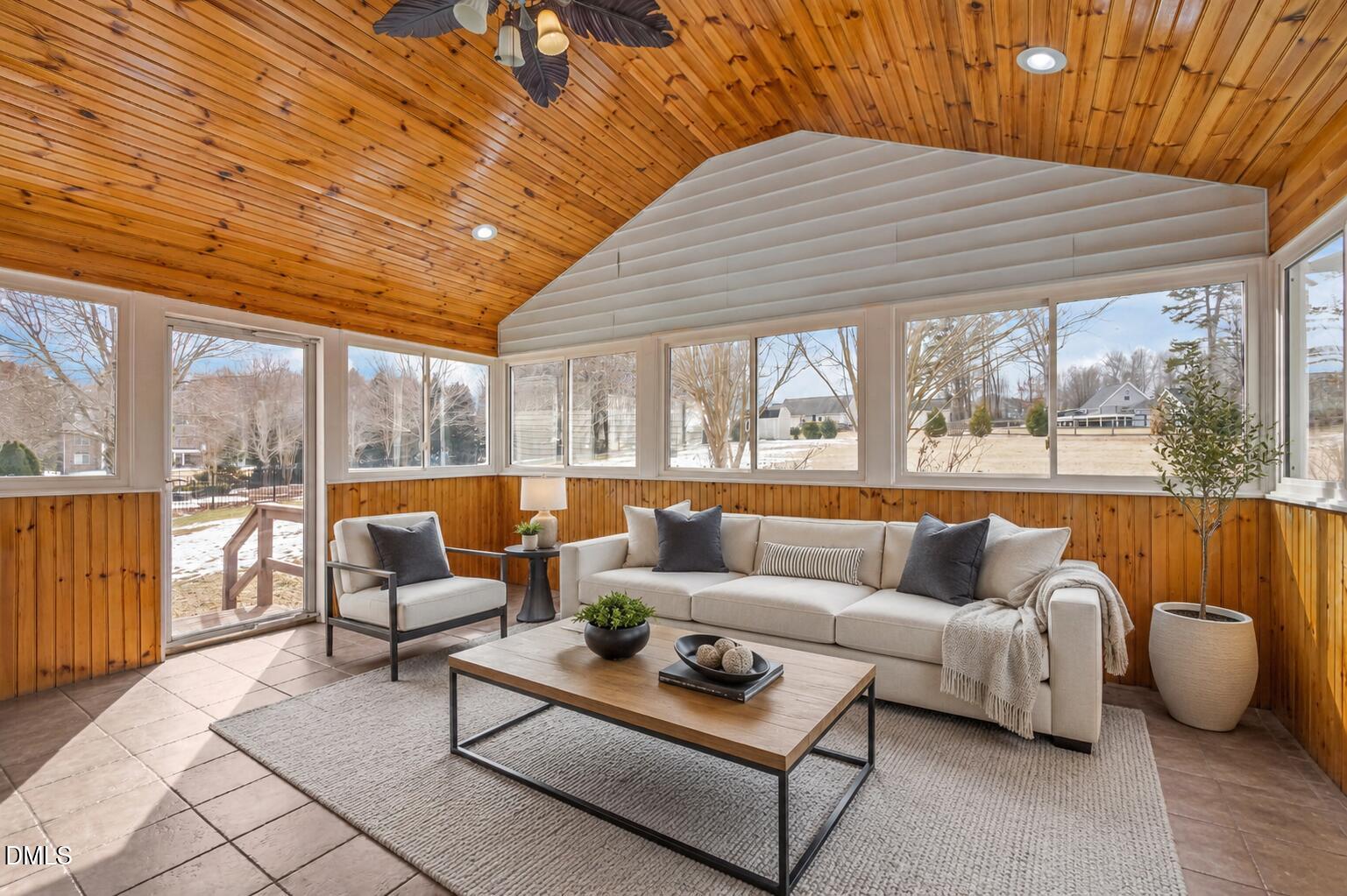 51 Water Front Lane Timberlake, NC 27583 - Photo 5 of 29 a living room with furniture and a large window