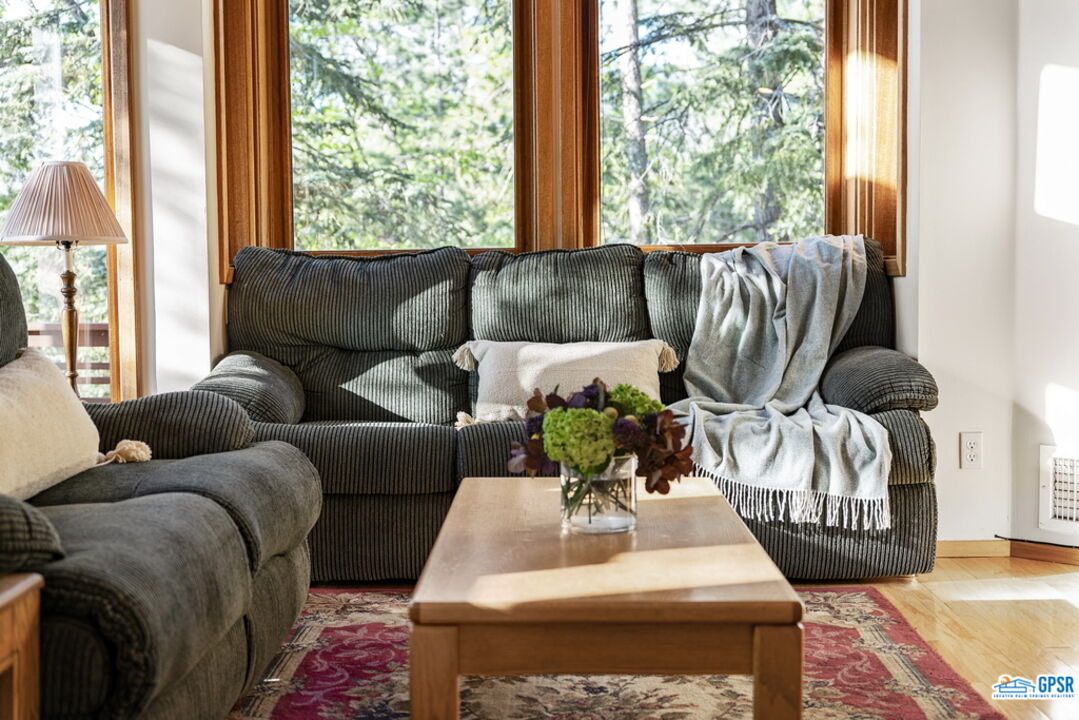 53085 Cedar Crest Drive Idyllwild, CA 92549 - Photo 15 of 55 a living room with furniture and a large window