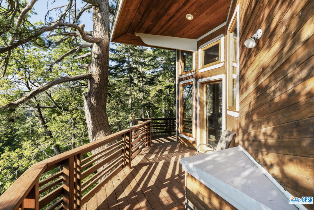 53085 Cedar Crest Drive Idyllwild, CA 92549 - Photo 21 of 55 a view of balcony with wooden floor and fence