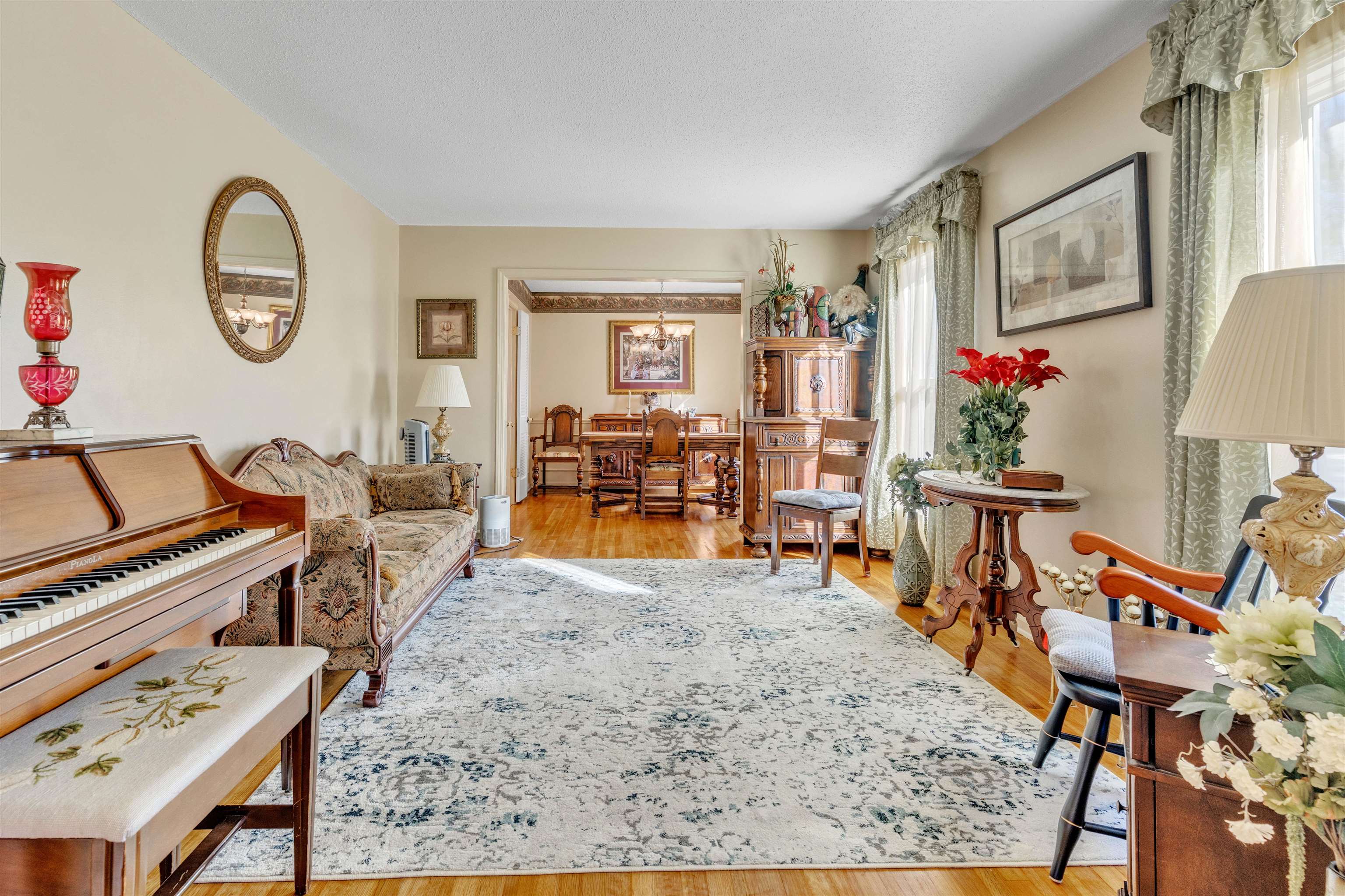 3613 Acacia Street Memphis, TN 38116 - Photo 4 of 33 wooden floor view with living room and dining room