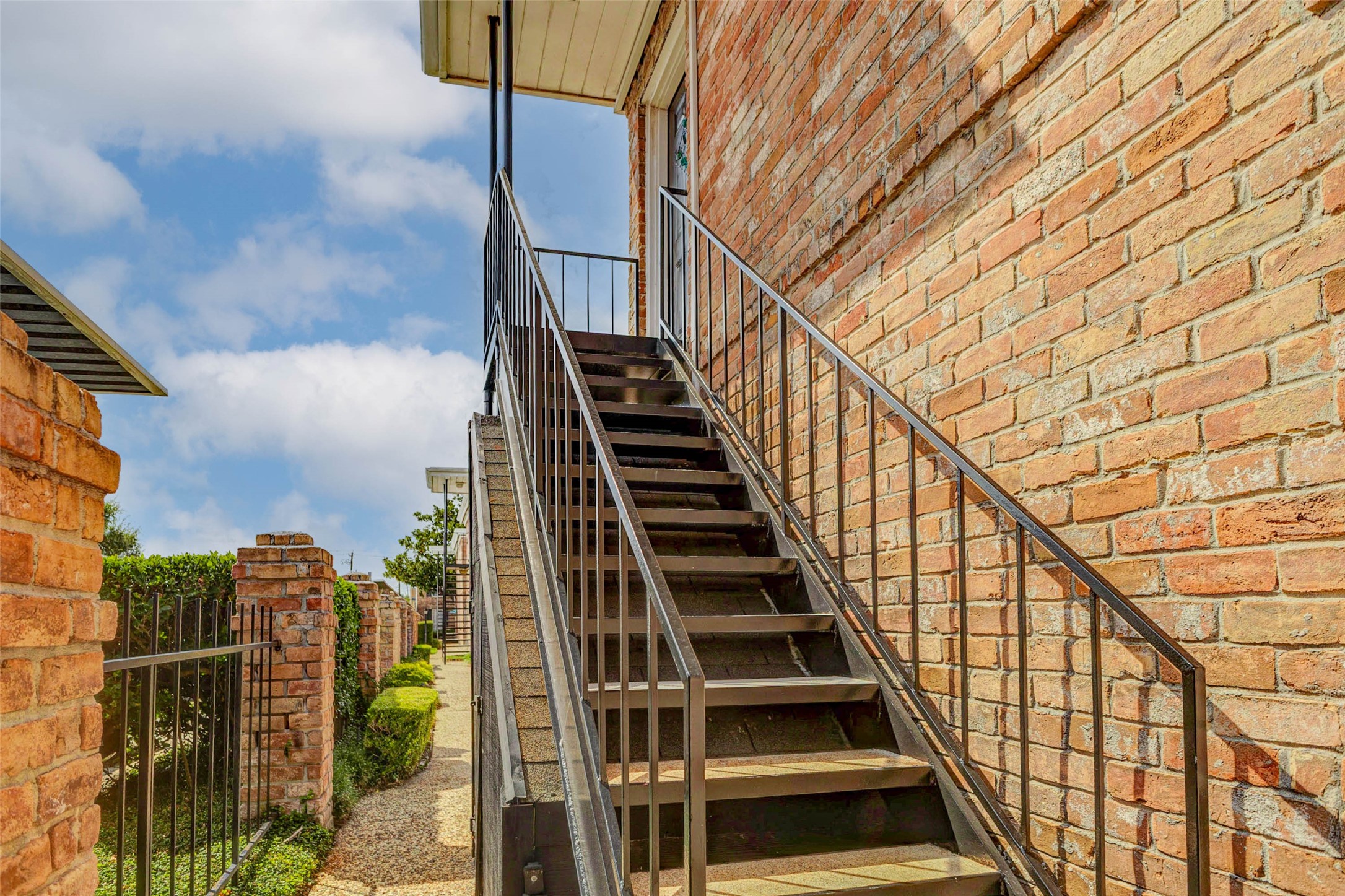 6402 Del Monte Drive, Unit 65 Houston, TX 77057 - Photo 18 of 21 a view of entryway with wooden floor